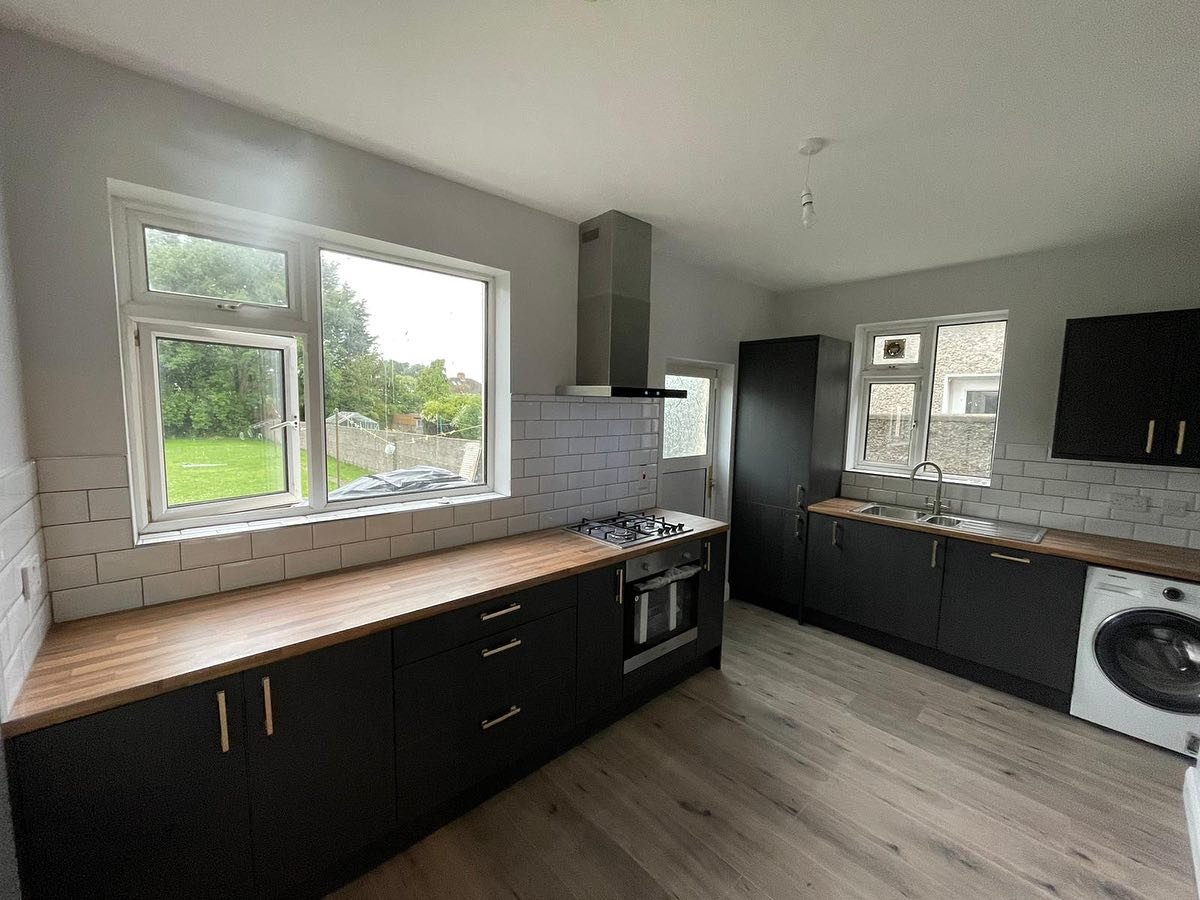 Contemporary Kitchen Transformation with Mather Door in Legno Graphite image 1