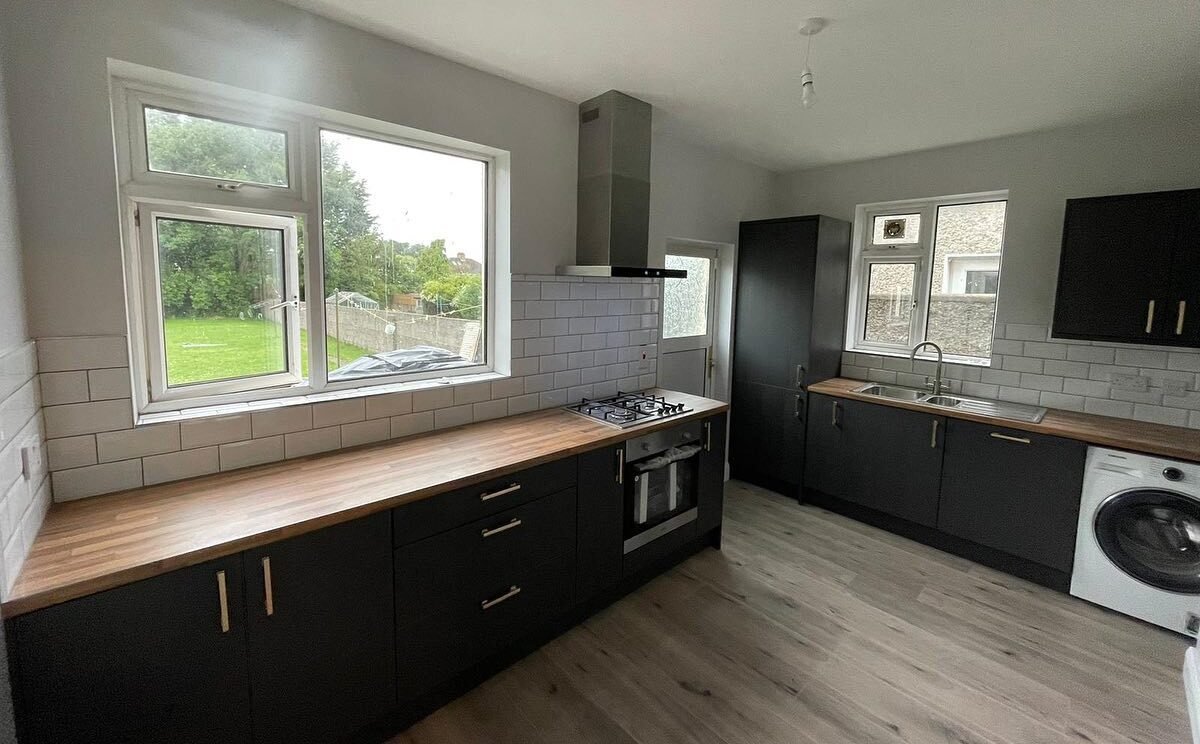 Contemporary Kitchen Transformation with Mather Door in Legno Graphite